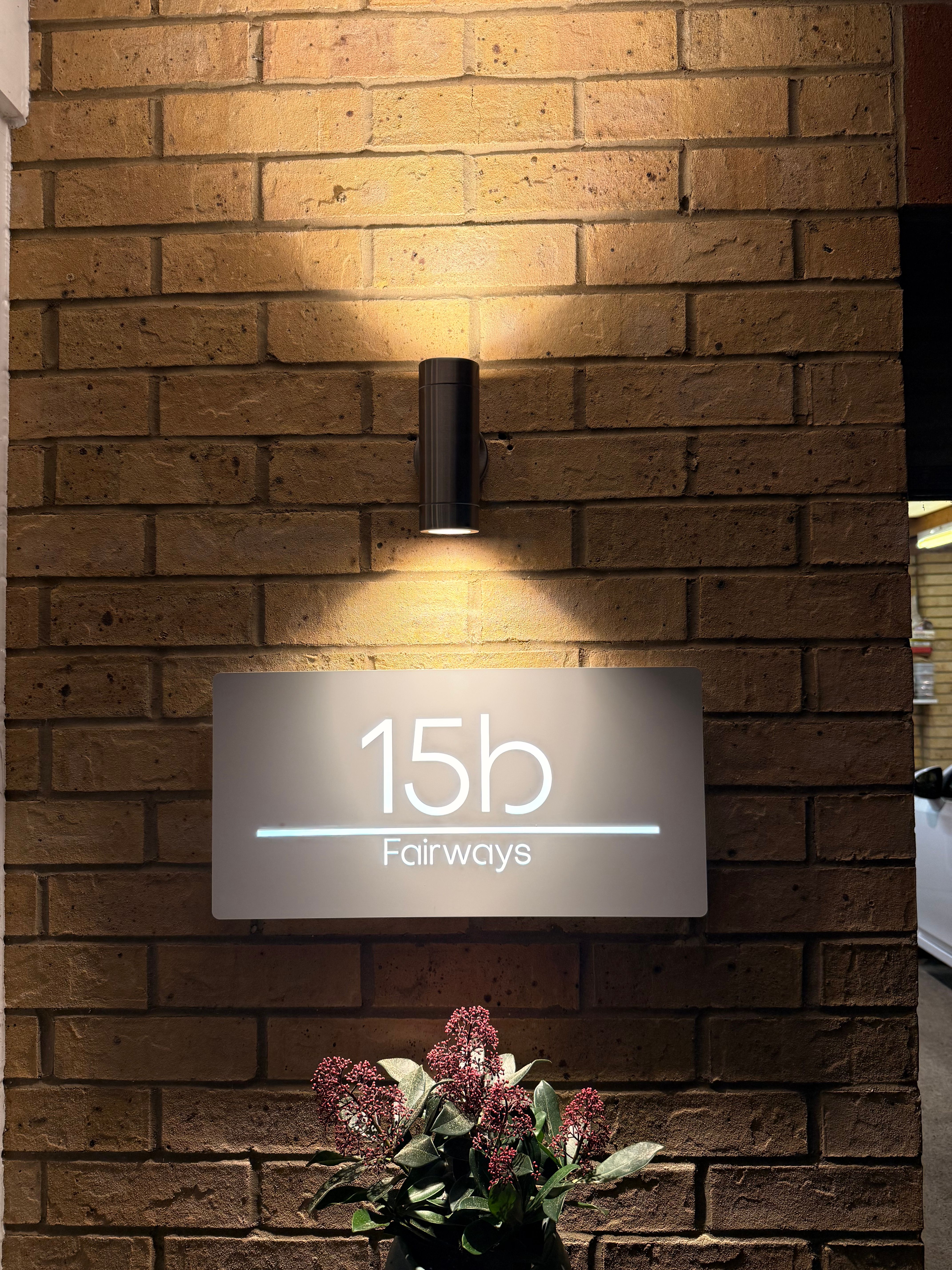 Illuminated sign installation